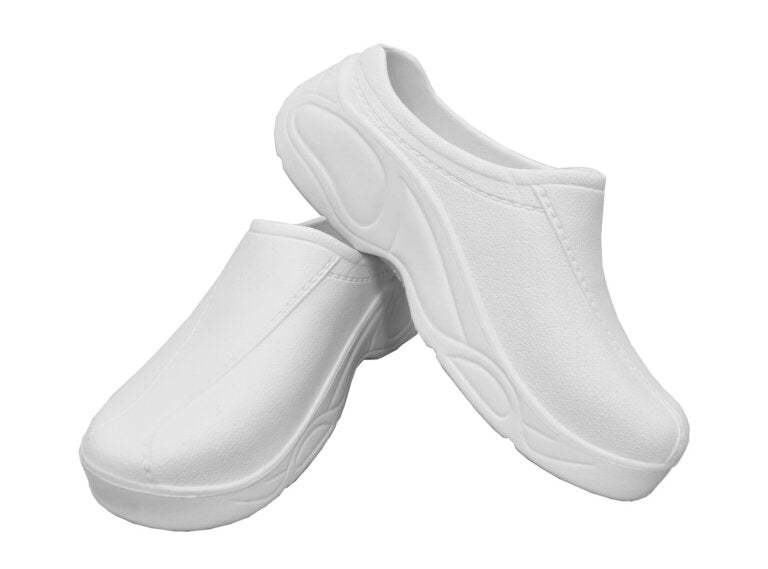 White strapless clogs for healthcare professionals. The image shows lightweight, slip-on shoes made from EVA foam, designed to provide comfort during long shifts.