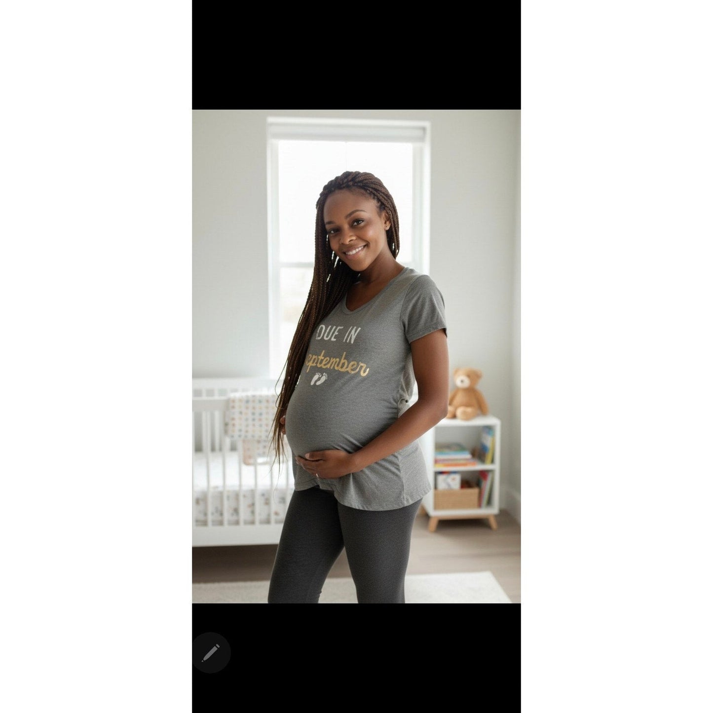 Maternity shirt with "Due in September" graphic, soft stretchy fabric, flattering belly fit, ideal for pregnancy wear