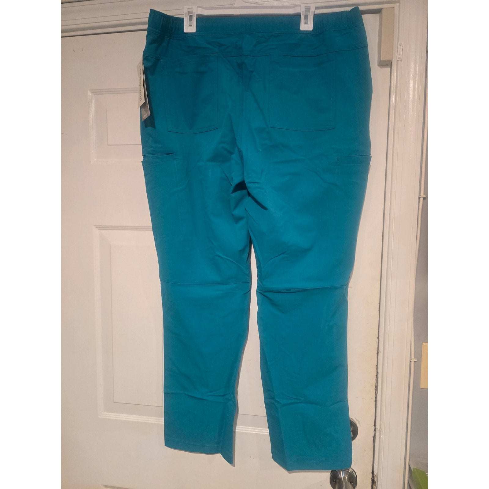 Cherokee Euphoria men’s teal blue cargo scrub pants with multiple pockets and antimicrobial fabric technology