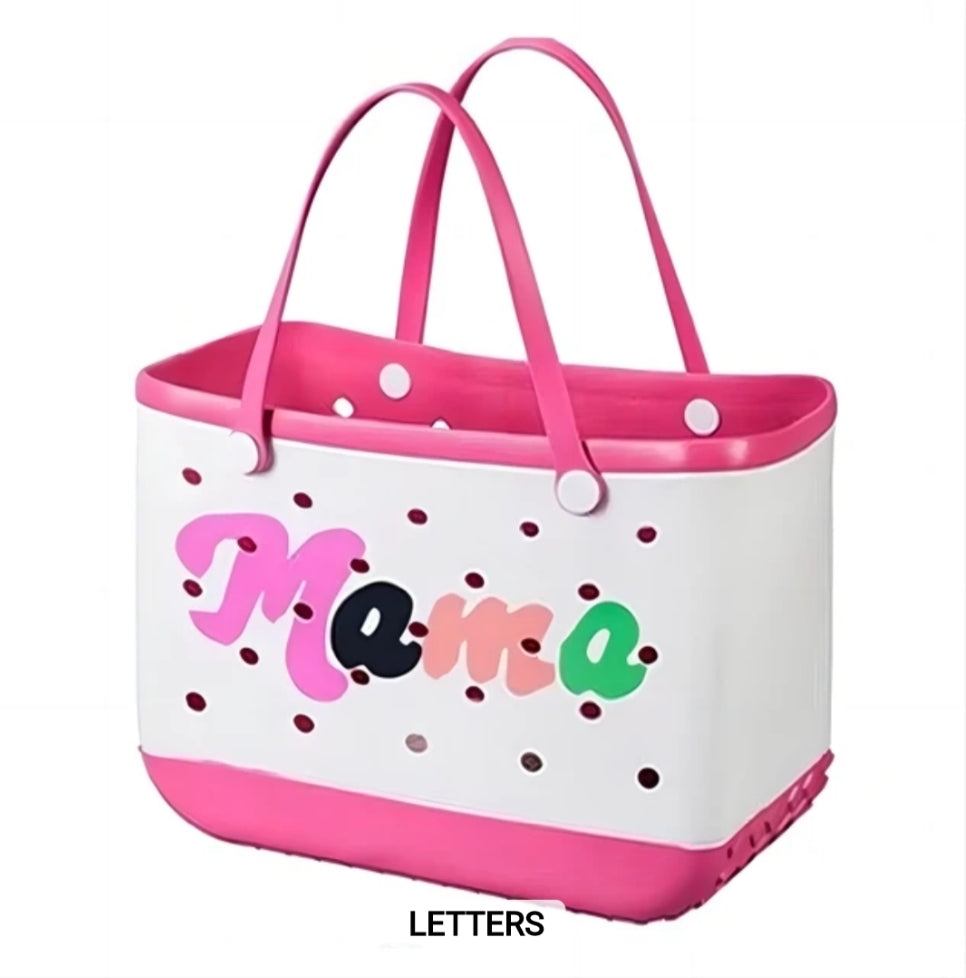 Pink and white tote bag with colorful "Mama" letters and polka dot design