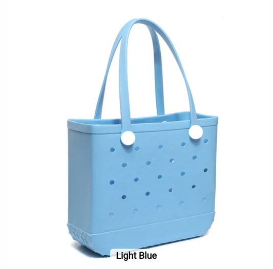 Light blue EVA utility tote bag with ventilated design and sturdy handles, waterproof and lightweight for beach, travel, and daily use