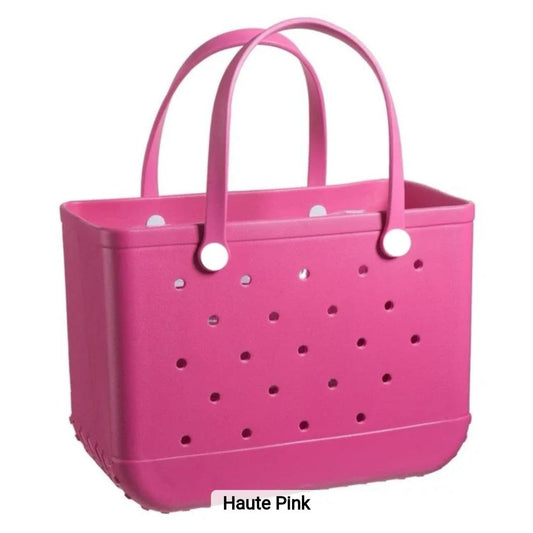 Pink EVA utility tote bag with perforated sides and sturdy handles for versatile everyday use